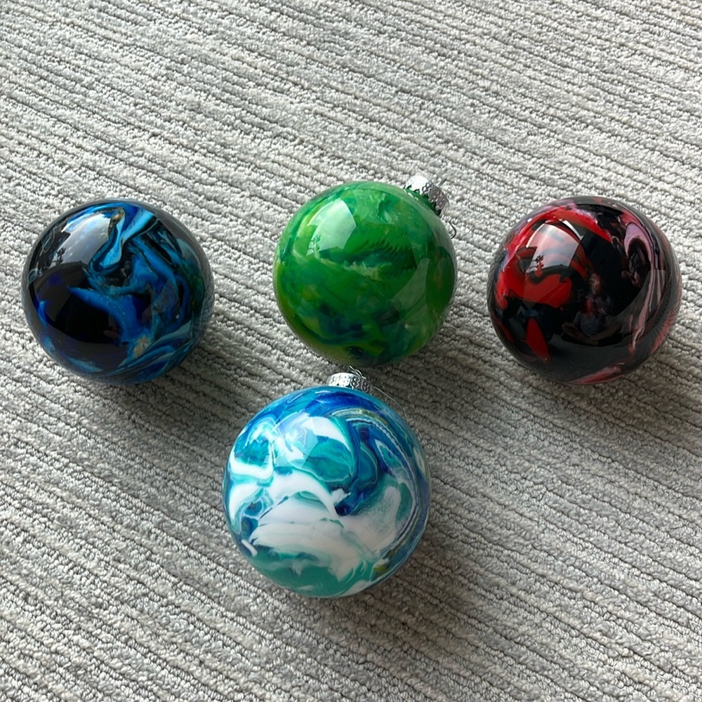 Four Handmade glass ball ornaments